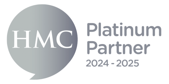 HMC Platinum Partner 2025-2026 logo featuring a silver speech bubble with 'HMC' in white text, alongside the words 'Platinum Partner 2025-2026' in silver text.
