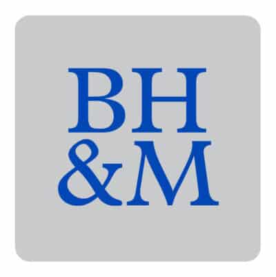 A simple logo featuring the blue serif initials “BH & M” arranged in two lines on a light grey rounded-square background.